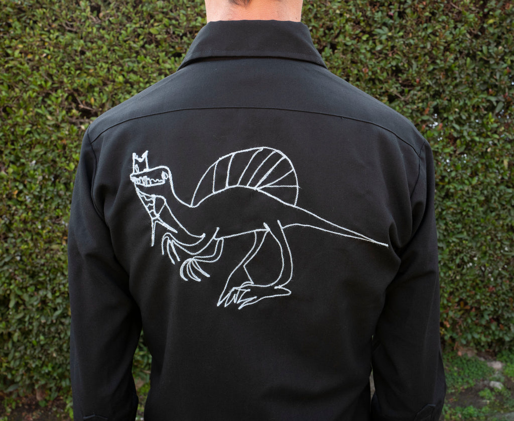 Long sleeve black button up shirt: raptors and spinosaurus