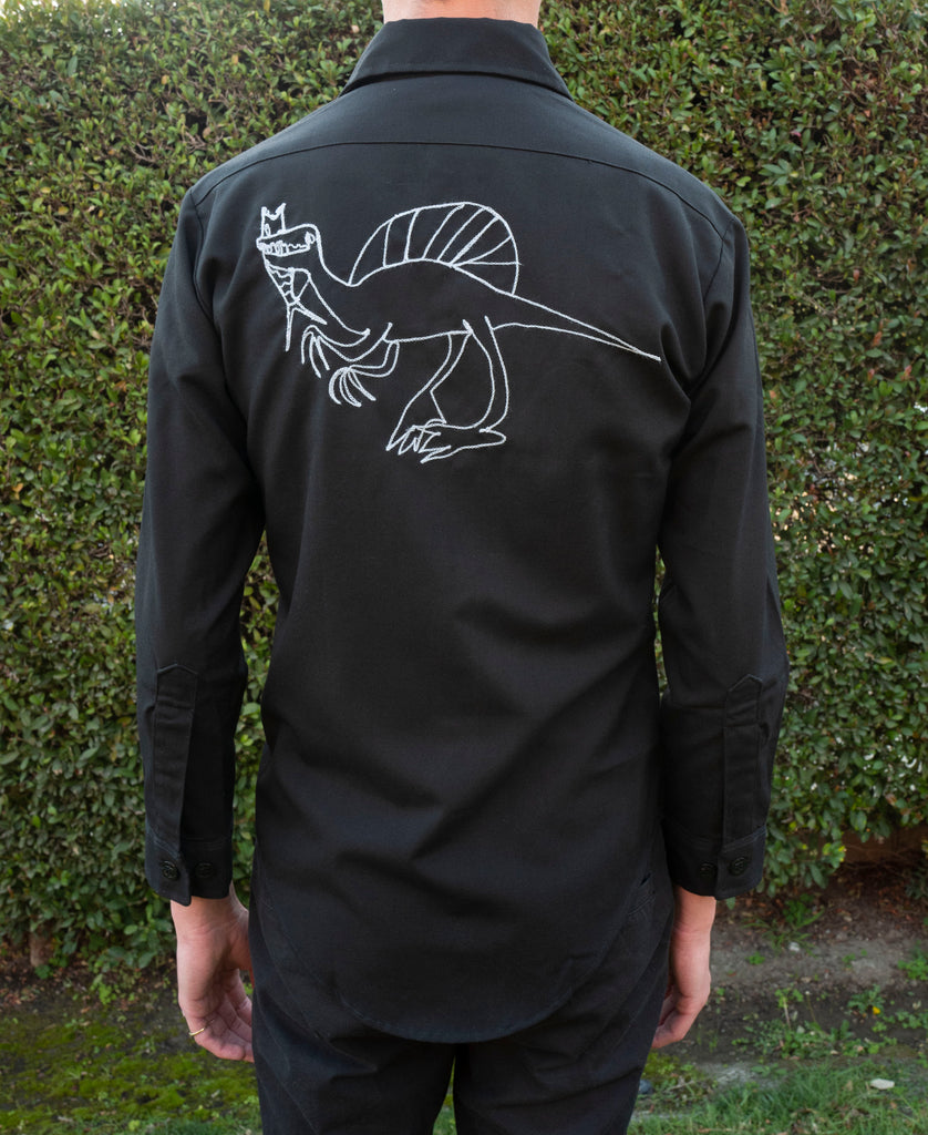 Long sleeve black button up shirt: raptors and spinosaurus